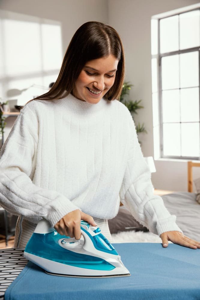 women using an iron